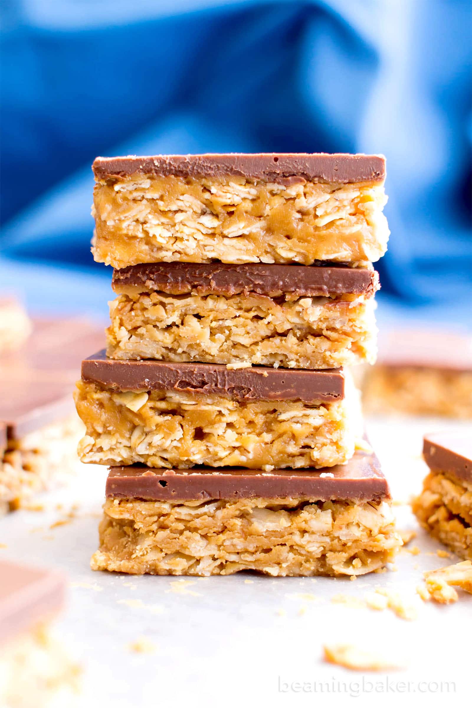 4 Ingredient No Bake Chocolate Peanut Butter Cup Granola Bars (GF, V): an easy, protein-rich recipe for decadent PB granola bars covered in chocolate, made with whole ingredients. #Vegan #ProteinPacked #GlutenFree #DairyFree #WholeGrain | BeamingBaker.com