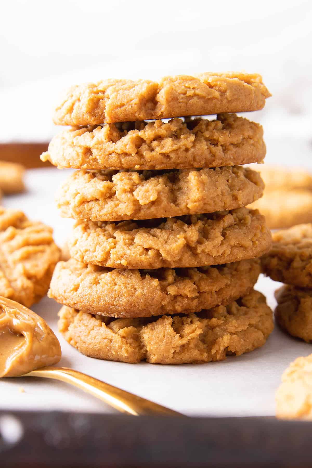 a tall stack of keto peanut butter cookies