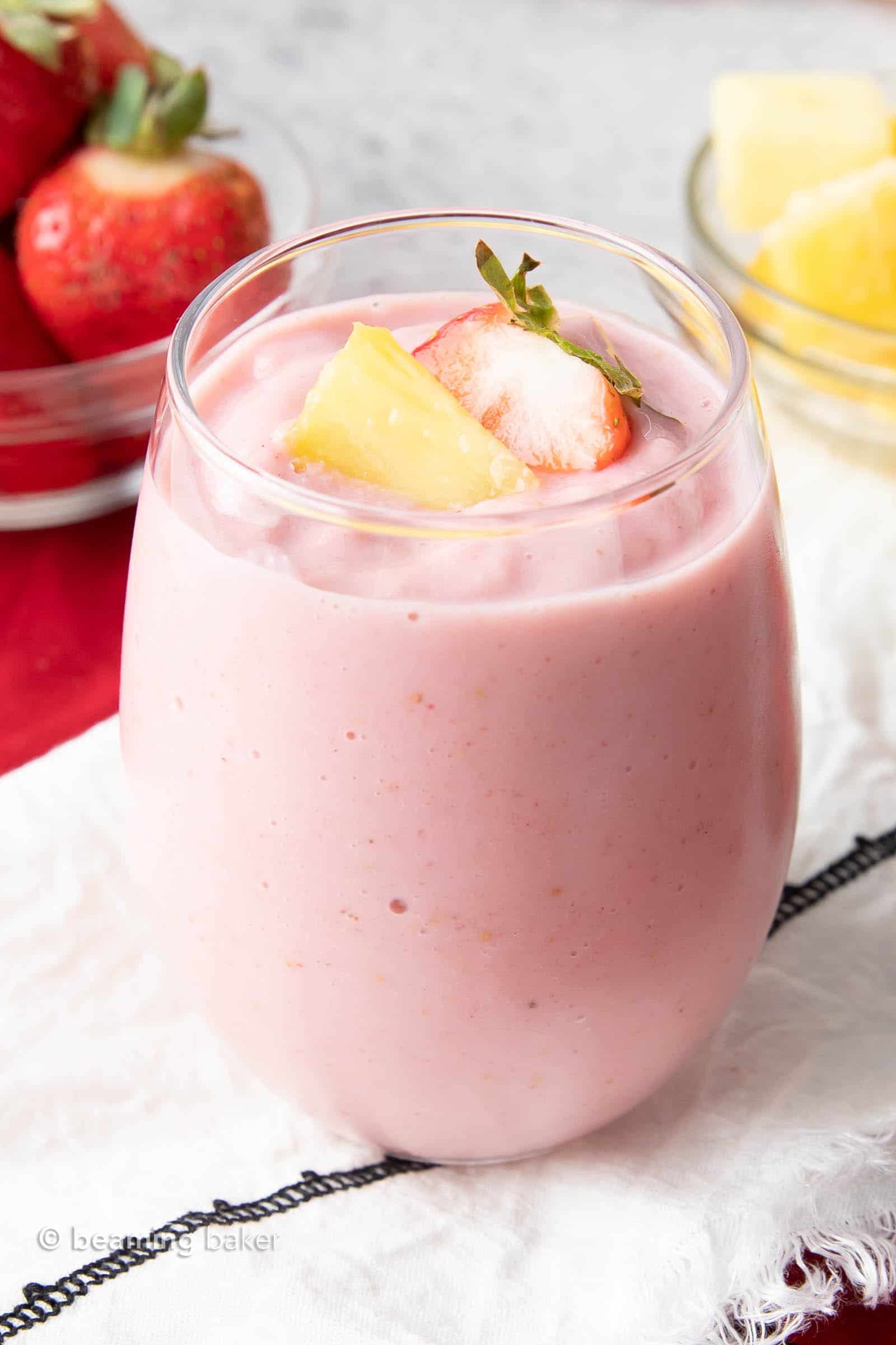 3 Ingredient Strawberry Pineapple Smoothie – a refreshingly simple strawberry pineapple smoothie made with just 3 ingredients! Frosty ‘n thick with refreshing fruity flavor. #Strawberry #Pineapple #Smoothie | Recipe at BeamingBaker.com
