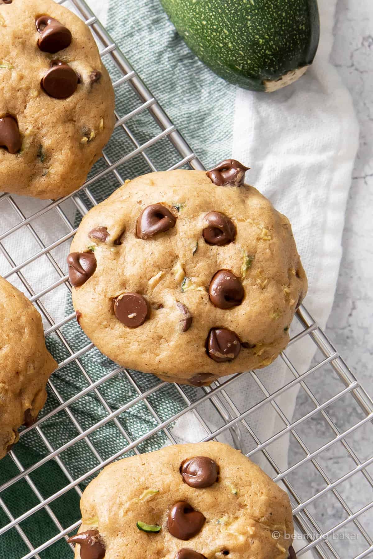 Melty chocolate chips on soft baked chocolate chip cookies with zucchini